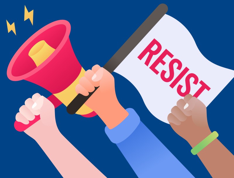 protestors with a Resist banner